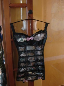 I love this corset hanger for containing some earrings & pendants.
