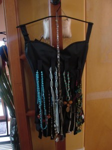 You can hang some necklaces on the back.