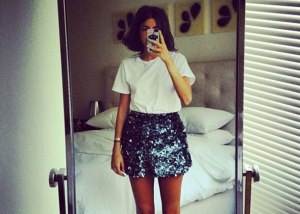 When paired with a tucked-in white tee, sequins suddenly feel far more wearable. Leandra Medine, via Instagram/@manrepeller