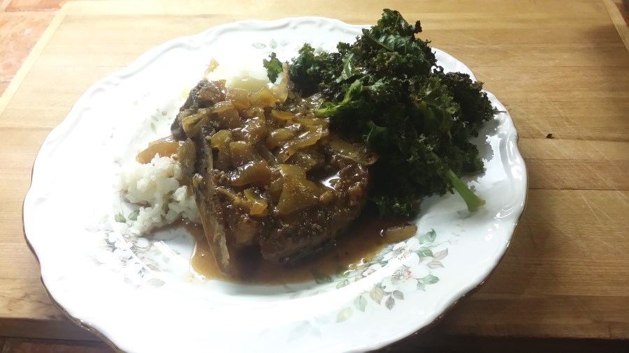Maple Dijon Pork Chops seved over rice with side of crispy oven-baked kale. Photo: d. king