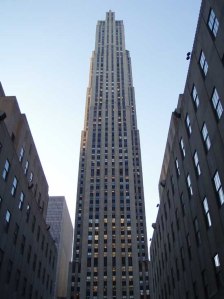 Rockefeller Center, including its centerpiece tower (seen here shortly before its 1933 opening and now familiarly known as 30 Rock) was primarily designed by architect Raymond Hood