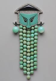 Georges Fouquet’s 1923 jade, onyx and diamond dress ornament is in the collection of New York’s Metropolitan Museum of Art.