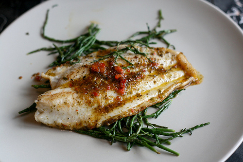 Super Sole Sunday.  Panfried with a light homemade breading over sea asparagus (sautéed in a little butter by itself).  Sides of steamed farmers market carrots and wild rice.