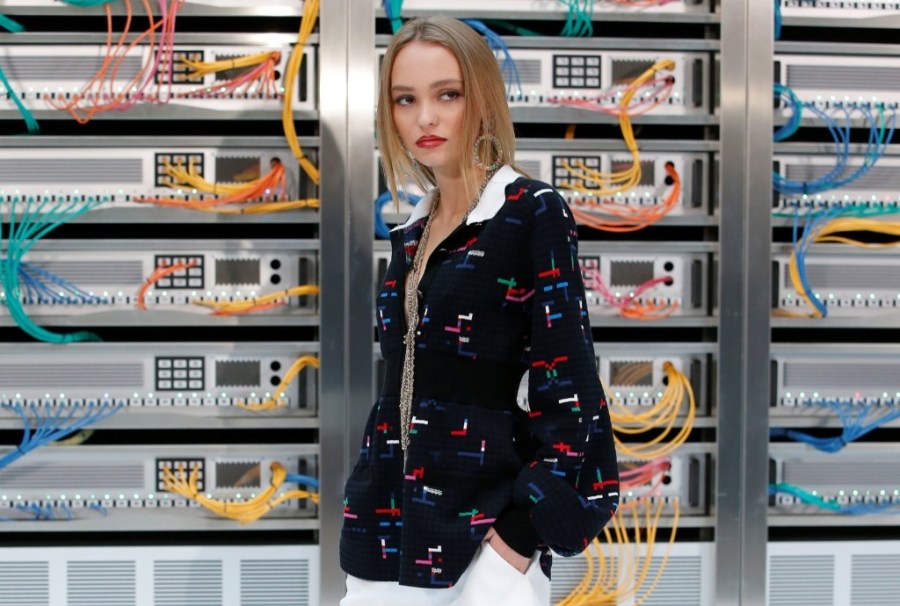 Lily-Rose Depp during a photocall before the Chanel show. REUTERS/Gonzalo Fuentes 