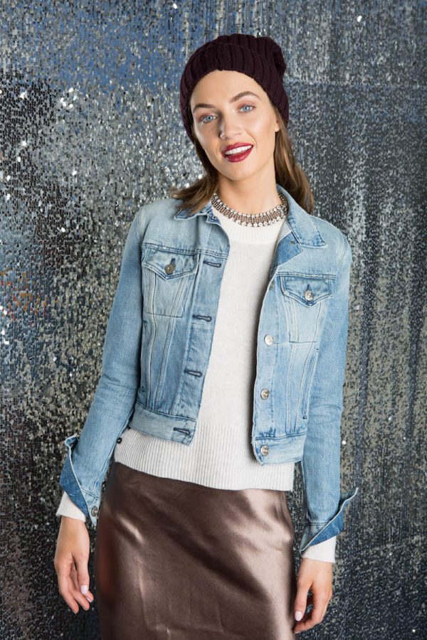 Dressed-Up Denim Transition your jean jacket to winter by layering it over cashmere. Elevate it with a champagne maxi skirt and our Soia & Kyo knit beanie for date night.